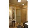 Bathroom with tiled shower and double vanity at 6302 Pleasant Hill Church Rd, Marshville, NC 28103