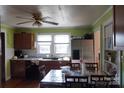 Bright kitchen with stainless steel appliances and wood cabinets at 6302 Pleasant Hill Church Rd, Marshville, NC 28103