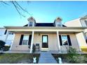 Two-story house with a covered porch and landscaping at 8024 Bronze Pike Dr, Charlotte, NC 28273