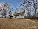 Charming house with a spacious yard and covered porch at 165 Bowman Rd, Statesville, NC 28625