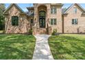 Front entrance with ornate double doors and brick staircase at 209 E Glenview Dr, Salisbury, NC 28147