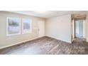 Simple living room featuring wood-look floors at 2331 Celia Ave, Charlotte, NC 28216