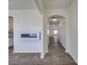 Bright entryway with an electric fireplace and hardwood floors at 2841 Kinloch Ct, Clover, SC 29710