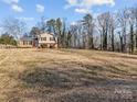 House on a large lot with mature trees at 4532 Oakwood Cir, Gastonia, NC 28056