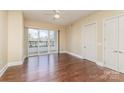 Bright bedroom with hardwood floors and private balcony at 4620 Piedmont Row Dr # 318D, Charlotte, NC 28210