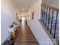 Bright foyer with hardwood floors and view to living area at 6525 Gopher Rd, Indian Land, SC 29707