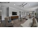 Virtually staged living room featuring hardwood floors and open floor plan at 730 Bushel Dr, Fort Mill, SC 29715