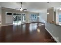 Bright and airy living area with hardwood floors and sliding glass doors at 9140 Carneros Creek Rd, Charlotte, NC 28214