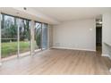 Living room with sliding glass doors leading to a patio at 9325 Old Concord Rd # C, Charlotte, NC 28213