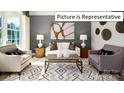 Living room features neutral palette and stylish furnishings at 1002 Merganser Way, Indian Trail, NC 28079