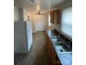 Functional kitchen with stainless steel sink and ample counter space at 1217 Spruce St, Charlotte, NC 28203