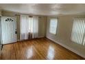 Inviting living room featuring hardwood floors and ample natural light at 1217 Spruce St, Charlotte, NC 28203