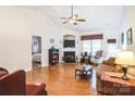 Living room features hardwood floors, fireplace, and access to bedroom at 2019 Stoney Point Cir, Monroe, NC 28112