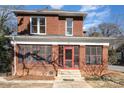 Brick facade, screened porch, and charming entryway at 414 W Harvie Ave, Gastonia, NC 28052