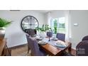 Cozy dining area with a large window, perfect for Gathering meals and entertaining guests at 1386 6Th Ne St, Hickory, NC 28601
