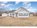 White house with gray accents and a landscaped yard at 6328 W Nc 10 Hwy, Hickory, NC 28602
