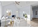 Spacious living room with vaulted ceiling, light gray walls, and L-shaped sofa at 109 E Broad St, Salisbury, NC 28144