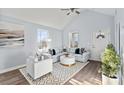 Bright living room featuring vaulted ceilings, hardwood floors, and comfy seating at 109 E Broad St, Salisbury, NC 28144