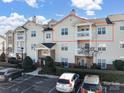 Condo building exterior, showing building features and parking at 19773 Deer Valley Dr, Cornelius, NC 28031