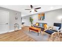 Light and airy living room with hardwood floors and modern decor at 2025 Ibis Ct, Charlotte, NC 28205