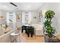 Bright dining area with built-in banquette and marble table at 203 Grandin Rd # 3, Charlotte, NC 28208