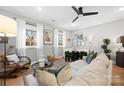 Spacious living room with comfy seating and large windows at 203 Grandin Rd # 3, Charlotte, NC 28208