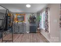 Bright dining area with hardwood floors and built-ins at 603 Helms Dr, Lowell, NC 28098