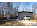 Contemporary style home with a detached studio and carport at 7117 W Sugar Creek Rd, Charlotte, NC 28269