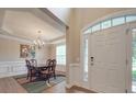 Formal dining room with hardwood floors, chandelier, and wainscoting at 8100 Avanti Dr, Waxhaw, NC 28173