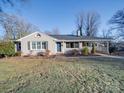 Updated ranch home with a covered porch and landscaped yard at 811 Colonial Dr, Rock Hill, SC 29730