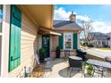 Cozy patio with seating area, grill, and potted plants at 823 Wynnshire Dr # C, Hickory, NC 28601