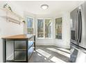 Kitchen island with butcher block countertop and view to backyard at 8406 Tifton Rd, Charlotte, NC 28226