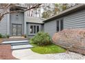 Inviting front entrance with double doors and stone pathway at 126 Tall Pines Ct, Lake Wylie, SC 29710