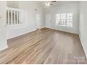 Bright and airy living room with hardwood floors and lots of natural light at 17015 Greenlawn Hills Ct, Charlotte, NC 28213