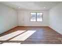 Bright living room with hardwood floors and windows at 2705 Lowell Bethesda Rd, Gastonia, NC 28056
