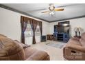 Comfortable living room features a large window, plush sofas and a flatscreen television at 906 16Th Nw St, Conover, NC 28613