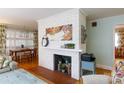 White brick fireplace as a focal point in the living area at 1223 India Hook Rd, Rock Hill, SC 29732