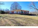 Brick ranch house with large yard and mature trees at 1491 Black Hwy, York, SC 29745