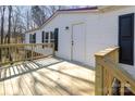 Newly built wooden deck with stairs leading to the ground at 1762 Proposal Ave, Chester, SC 29706