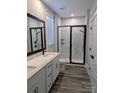 Bathroom boasts a double vanity, large shower, and modern fixtures at 1852 Yardley St, Rock Hill, SC 29732