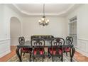 Elegant dining room featuring a tray ceiling and traditional decor at 3013 Misty Moss Ct, Waxhaw, NC 28173