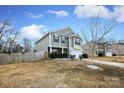 Two-story house with gray siding, stone accents, and a two-car garage at 4182 Cordell Ct, Midland, NC 28107