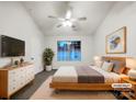 Virtually staged main bedroom with plush bed and modern dresser at 10306 Creswell Ct, Charlotte, NC 28215