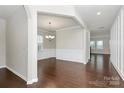 Elegant living room featuring hardwood floors and decorative molding, perfect for entertaining guests at 14812 Baytown Ct, Huntersville, NC 28078