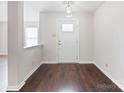 Bright entryway with hardwood floors and a white door leading into the home at 2010 Durand Rd, Fort Mill, SC 29715