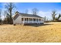 Gray house with white trim and a spacious yard at 344 Luther Scronce Rd, Vale, NC 28168