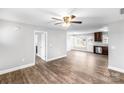 Open living area with wood-look floors and neutral paint at 413 Peach St, Kannapolis, NC 28083