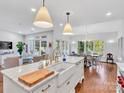 Spacious kitchen featuring a marble island and high-end appliances at 9 Pine Tree Rd, Salisbury, NC 28144