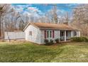 Ranch home with covered porch and large backyard at 3015 Pageland Hwy, Lancaster, SC 29720