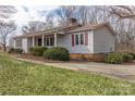 Ranch home with brick accents and mature landscaping at 3015 Pageland Hwy, Lancaster, SC 29720